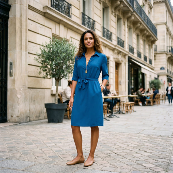 Navy Blue - Model wearing a solid collared midi shirtdress with short sleeves, a button-front placket, and a self-tie waist against a white background