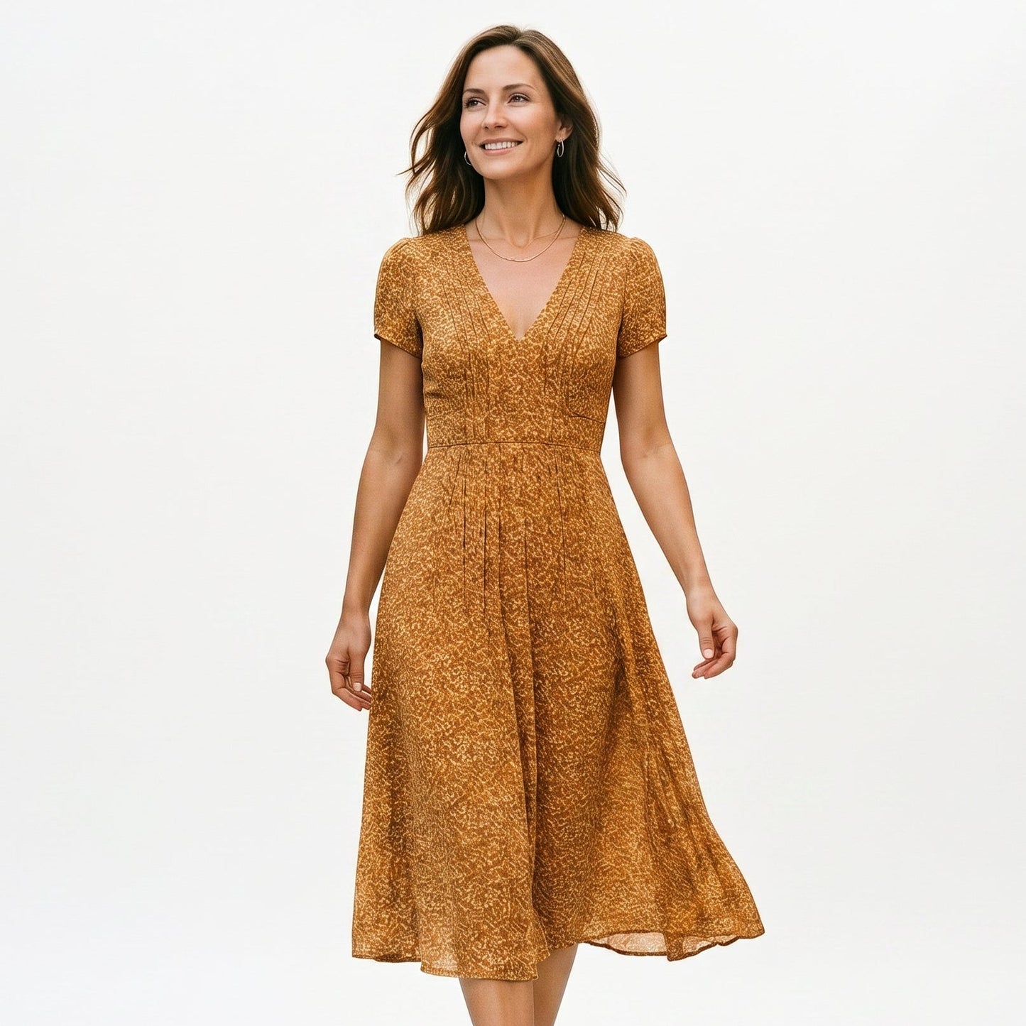 Yellow - Woman wearing a floral print midi dress featuring a V-neckline, short puff sleeves, and a flowing skirt.