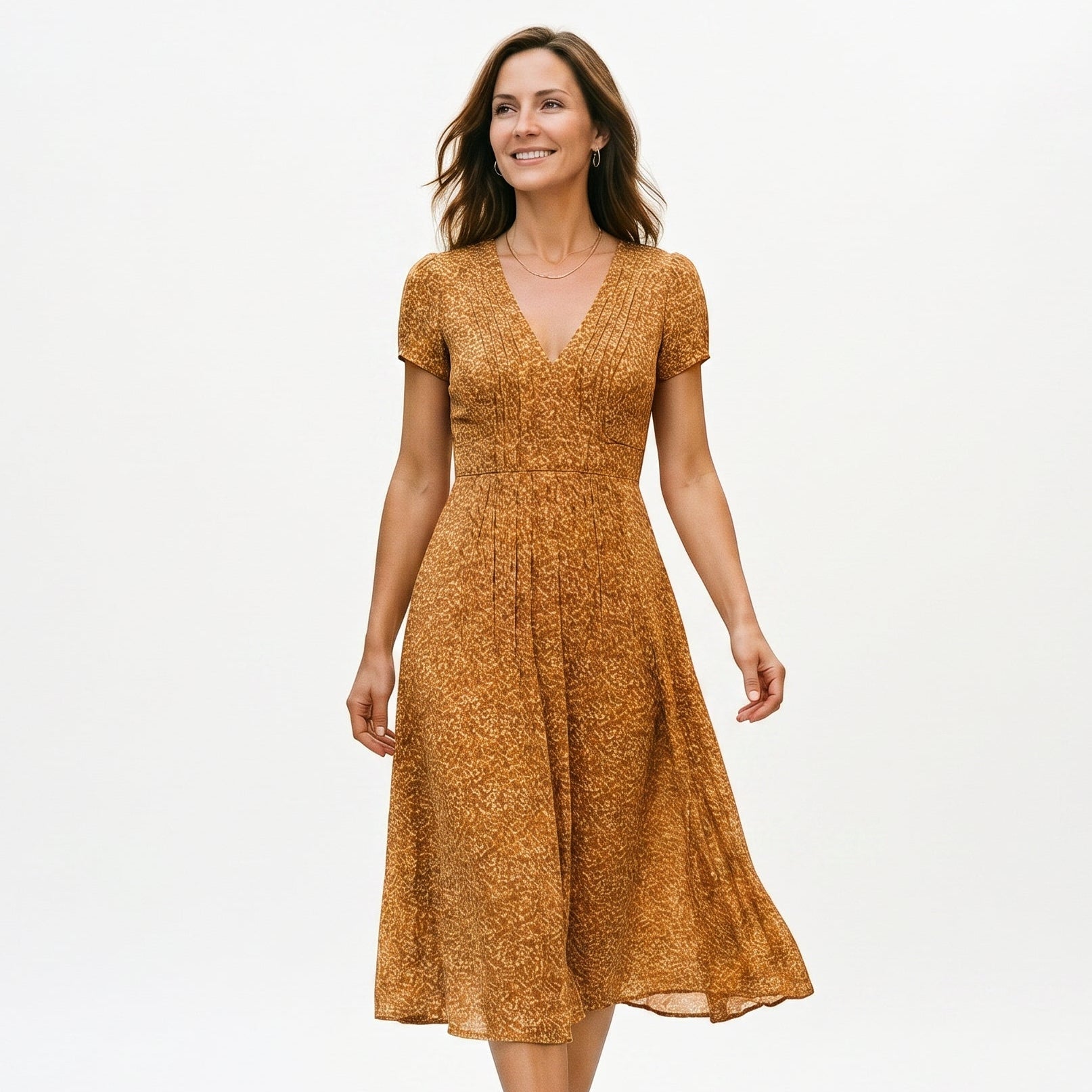 Yellow - Woman wearing a floral print midi dress featuring a V-neckline, short puff sleeves, and a flowing skirt.