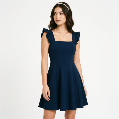 Dark Blue - Model wearing a solid square-neck mini dress featuring ruffled cap sleeves, a fitted bodice, and a flared A-line skirt.