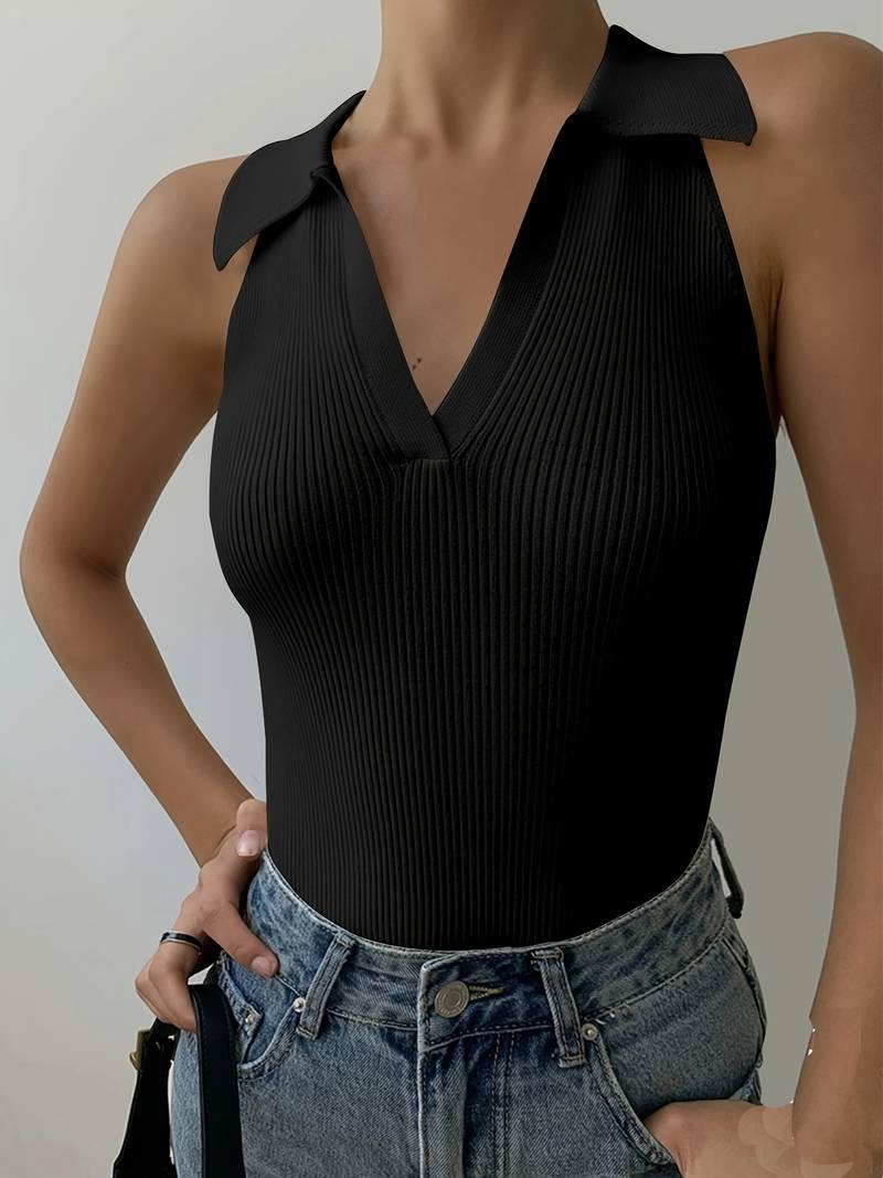 Woman in white ribbed halter top and denim shorts