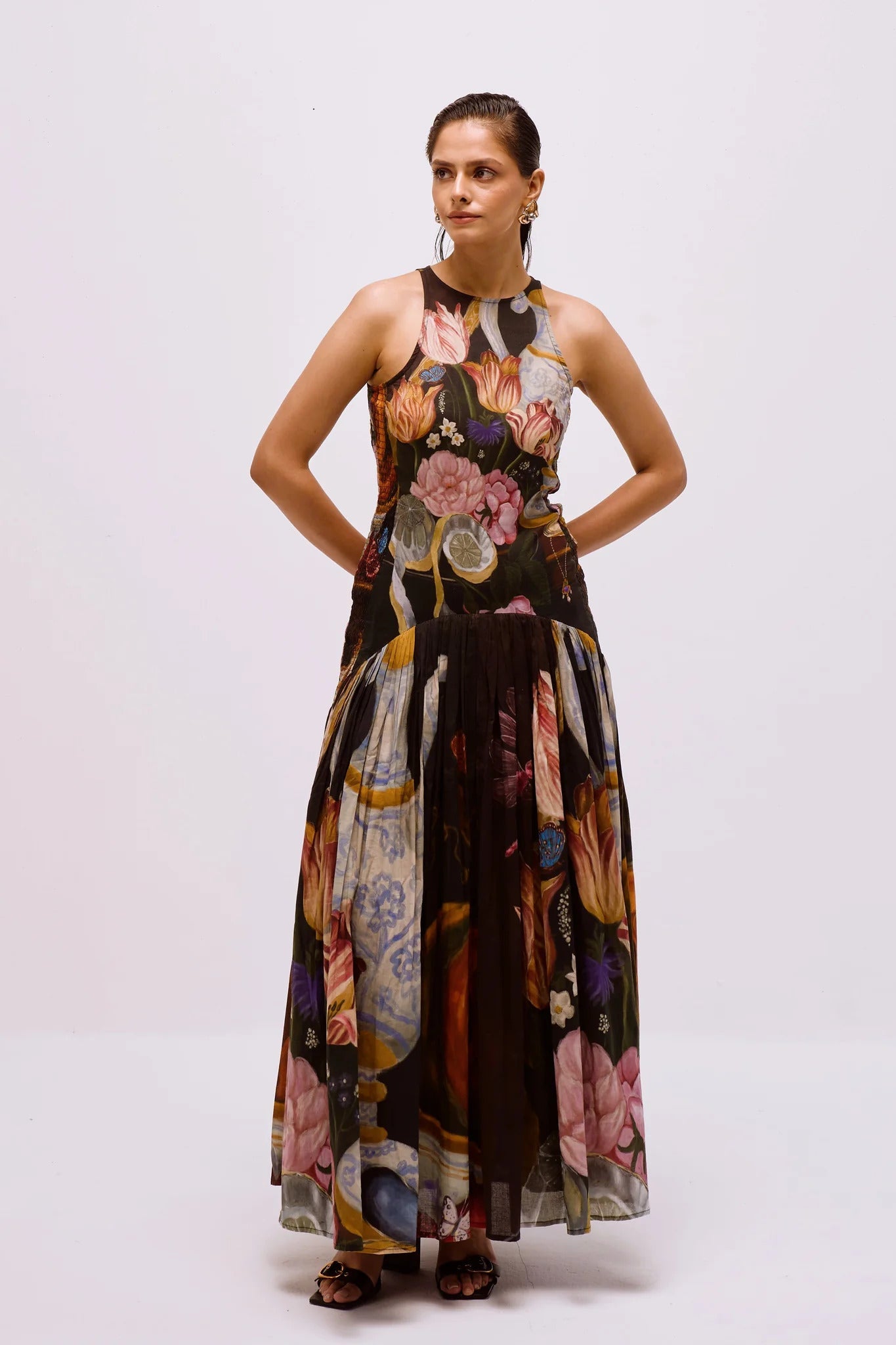 Woman in floral print chiffon maxi dress