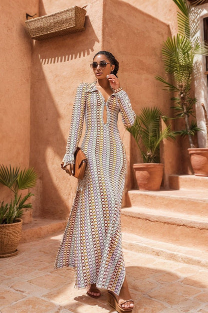 Woman in multicolored ribbed knit maxi dress with long sleeves and collared neckline