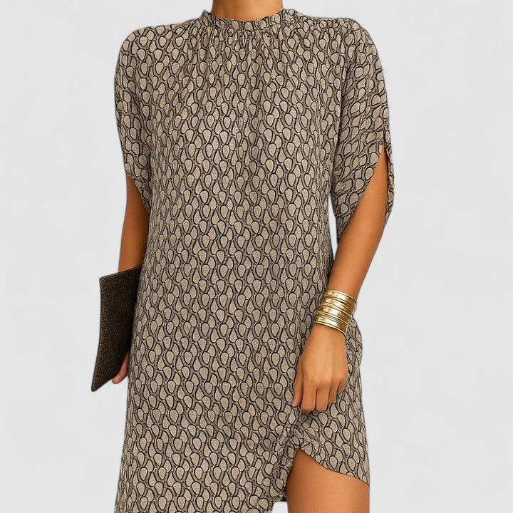 Beige Pattern - A woman wearing a dusty pink crepe shift dress featuring a gathered mock neckline, draped cap sleeves, and a relaxed silhouette.
