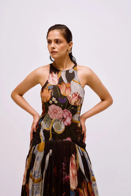 Woman in floral print chiffon maxi dress