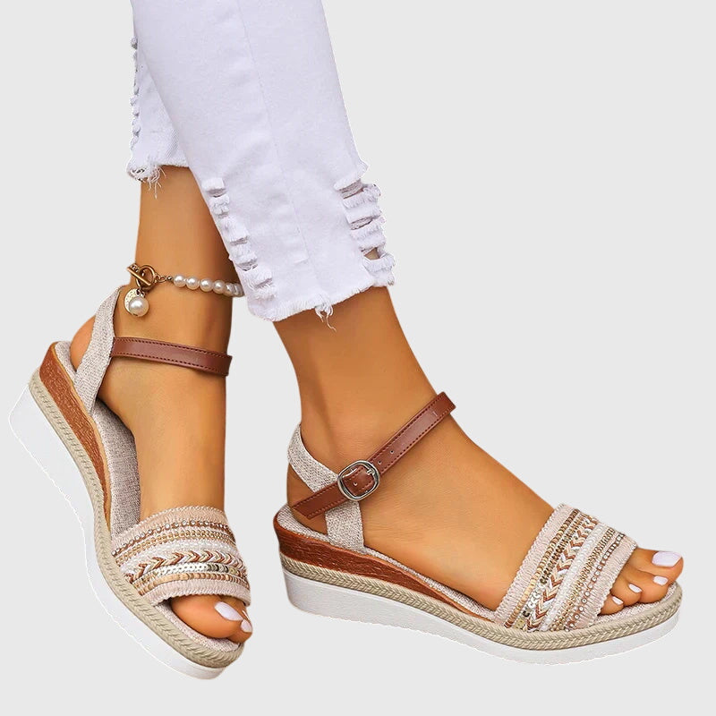 White/Brown - Women's open-toe wedge sandals featuring a breathable canvas upper, intricate beaded embroidery across the front strap, an adjustable faux-leather ankle strap, and a layered shock-absorbing sole.