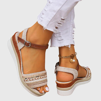 White/Brown - Women's open-toe wedge sandals featuring a breathable canvas upper, intricate beaded embroidery across the front strap, an adjustable faux-leather ankle strap, and a layered shock-absorbing sole.