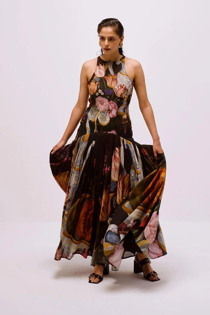 Woman in floral print chiffon maxi dress