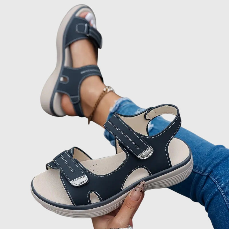Black - Textured faux-leather platform sandals featuring adjustable hook-and-loop straps, contrast stitching, and a thick cushioned sole.