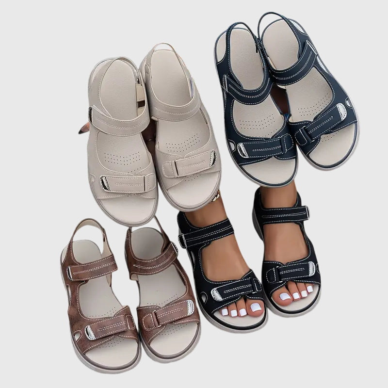 Black - Textured faux-leather platform sandals featuring adjustable hook-and-loop straps, contrast stitching, and a thick cushioned sole.