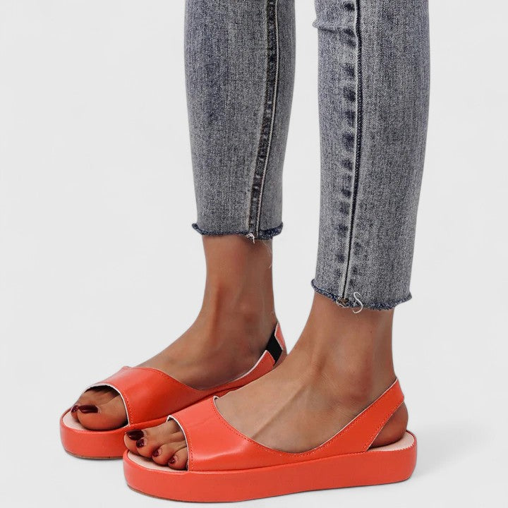 Pink - Women's smooth faux-leather platform sandals featuring a wide upper strap, open toe, and an integrated slingback strap on a thick cushioned sole.