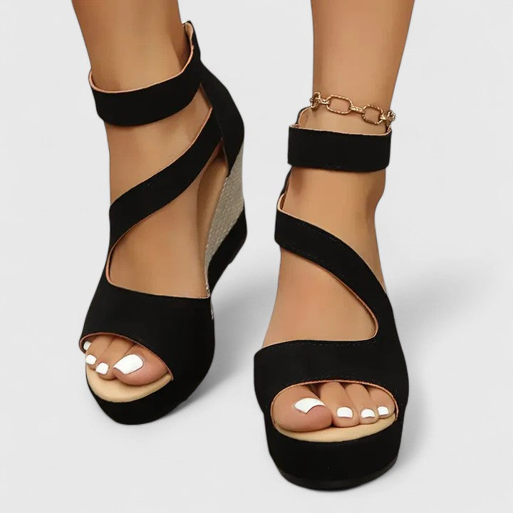Black - Women's open-toe wedge sandals featuring an asymmetric faux-suede upper, woven side panel detail, and a back heel zipper.