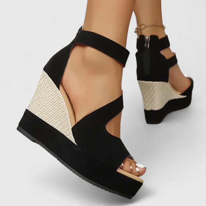 Black - Women's open-toe wedge sandals featuring an asymmetric faux-suede upper, woven side panel detail, and a back heel zipper.