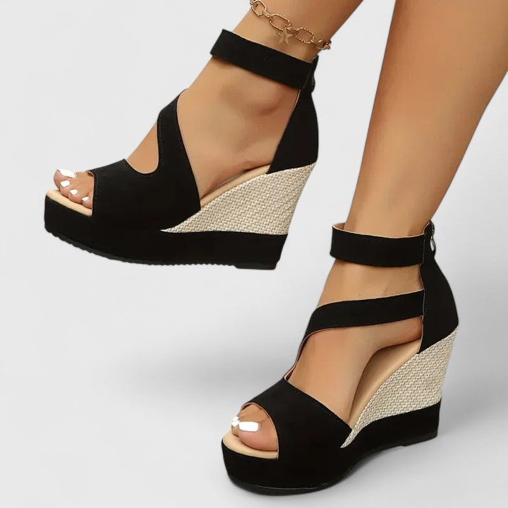 Black - Women's open-toe wedge sandals featuring an asymmetric faux-suede upper, woven side panel detail, and a back heel zipper.