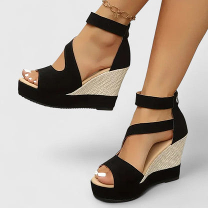 Black - Women's open-toe wedge sandals featuring an asymmetric faux-suede upper, woven side panel detail, and a back heel zipper.