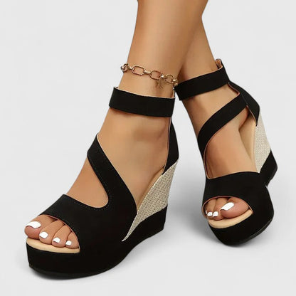 Black - Women's open-toe wedge sandals featuring an asymmetric faux-suede upper, woven side panel detail, and a back heel zipper.