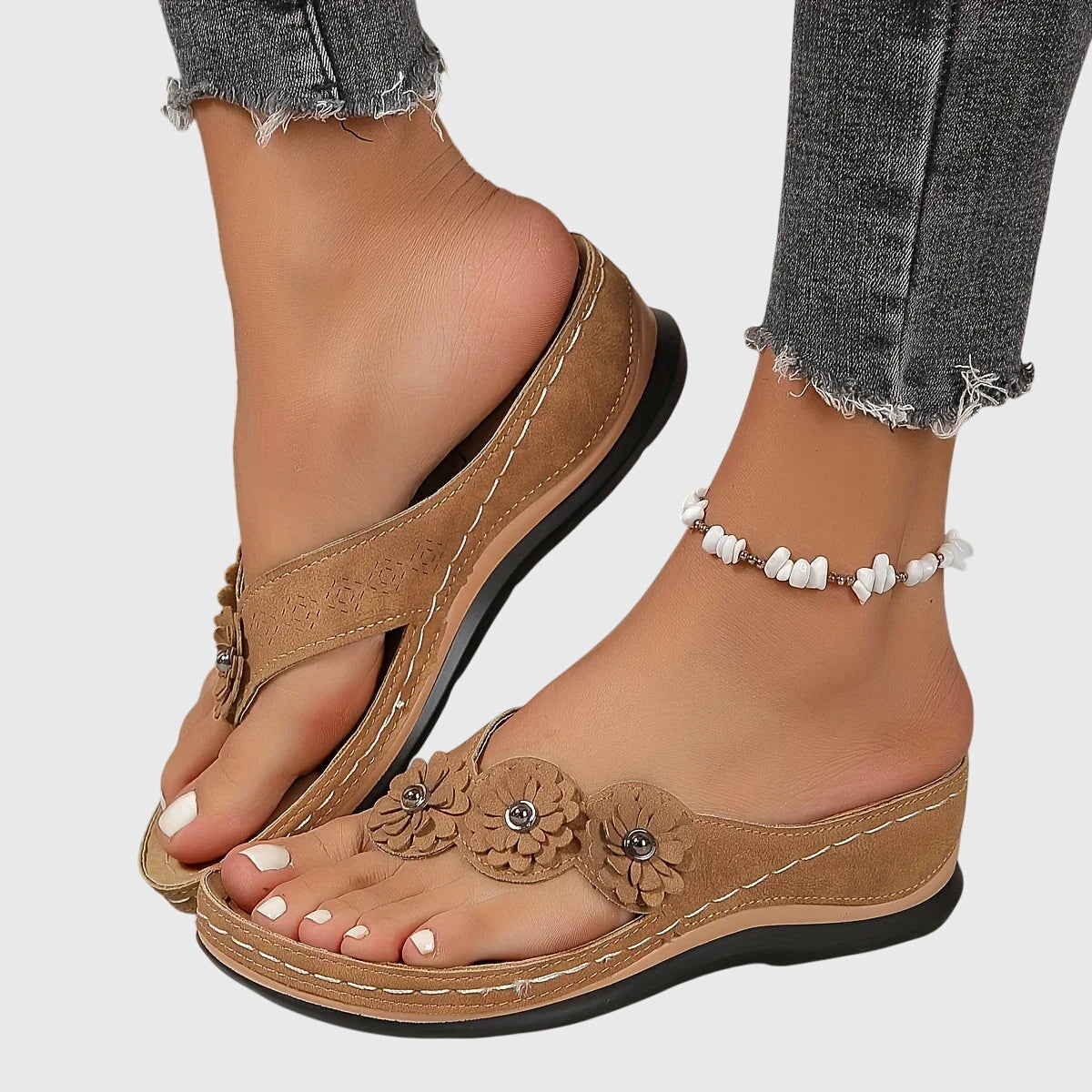 Dark Brown - Faux-suede slip-on wedge sandals featuring three floral appliques across the instep, contrast stitching details, and a contoured comfort footbed.