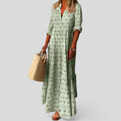 Sage Green - Women's long maxi dress featuring an all-over geometric print, 3/4 sleeves, and a tiered skirt.