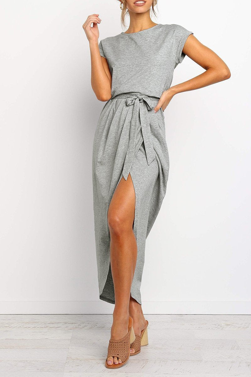 Army Green - Woman wearing a solid short sleeve midi dress with a tie waist and front slit hem