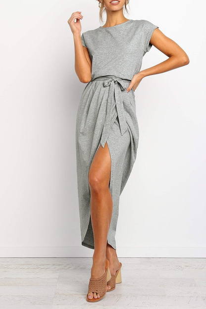 Army Green - Woman wearing a solid short sleeve midi dress with a tie waist and front slit hem