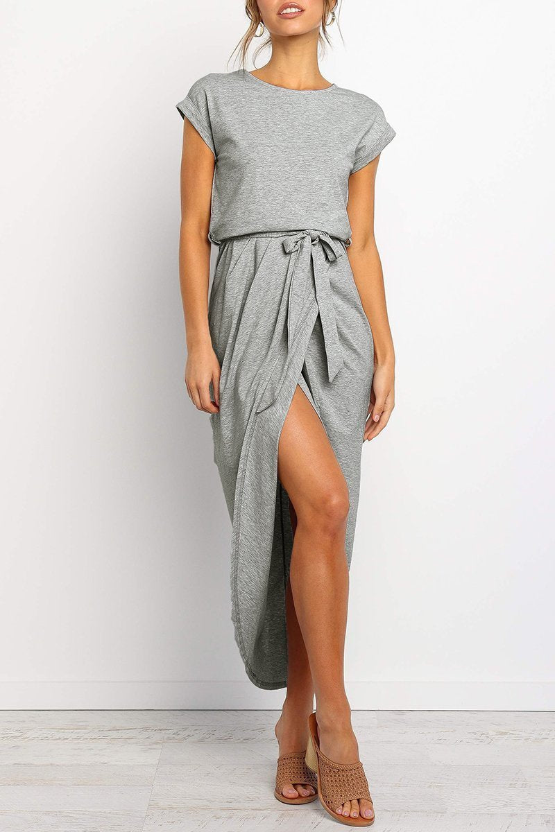 Light Gray - Woman wearing a solid short sleeve midi dress with a tie waist and front slit hem
