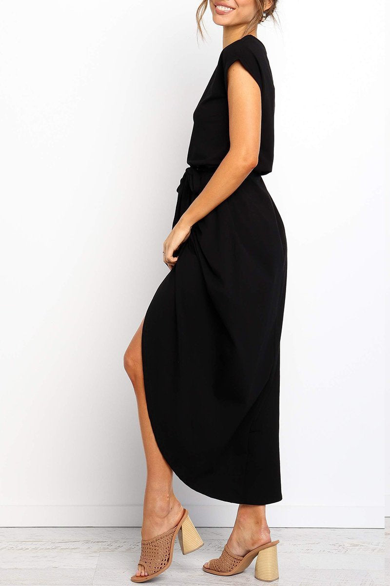 Black - Woman wearing a solid short sleeve midi dress with a tie waist and front slit hem