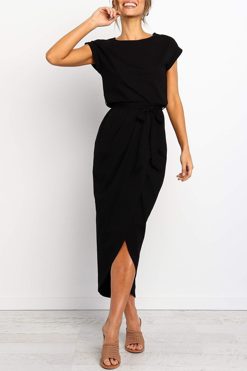 Black - Woman wearing a solid short sleeve midi dress with a tie waist and front slit hem