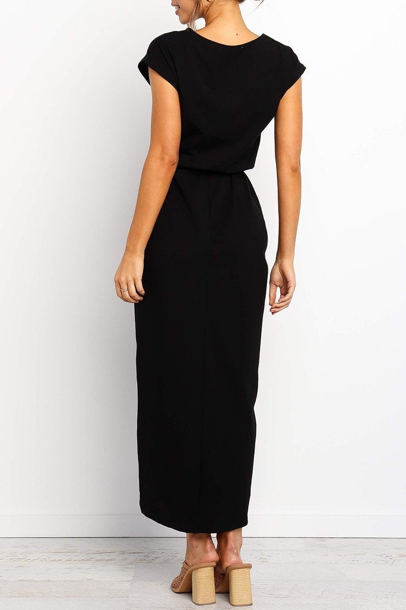 Black - Woman wearing a solid short sleeve midi dress with a tie waist and front slit hem