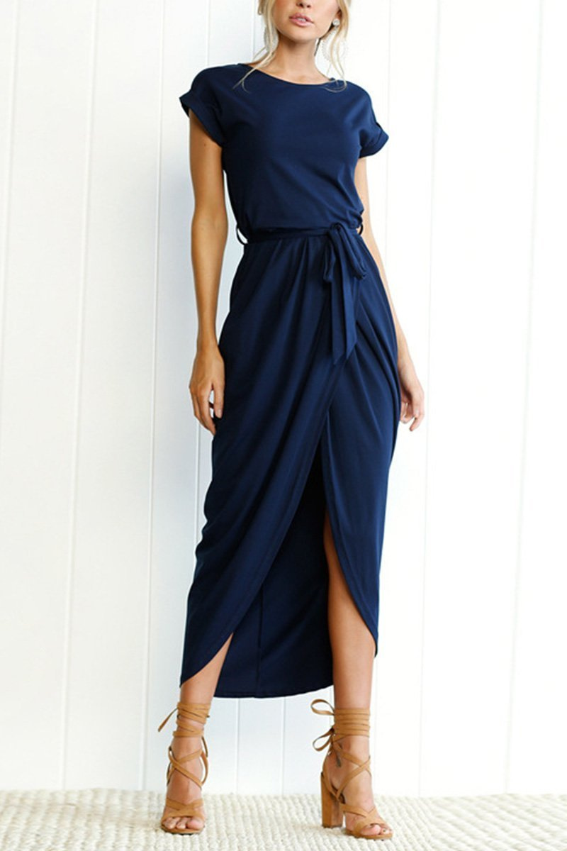 Navy - Woman wearing a solid short sleeve midi dress with a tie waist and front slit hem
