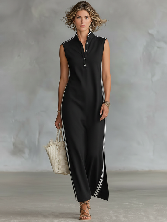 Black - A woman walking in a sleeveless maxi dress featuring a polo collar, button placket, and side slits, carrying a woven tote bag.