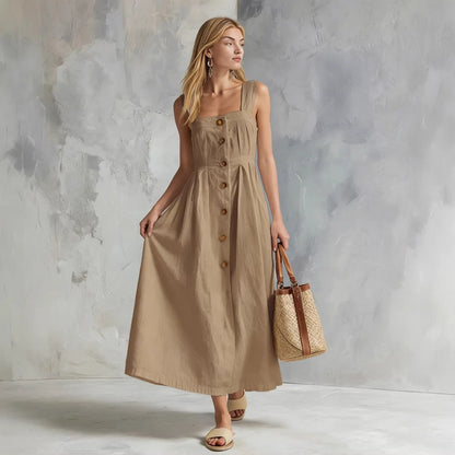 Khaki - A woman modeling a chocolate brown linen-blend midi sundress with a square neckline, wide straps, and a button-down front, holding a woven straw tote bag.