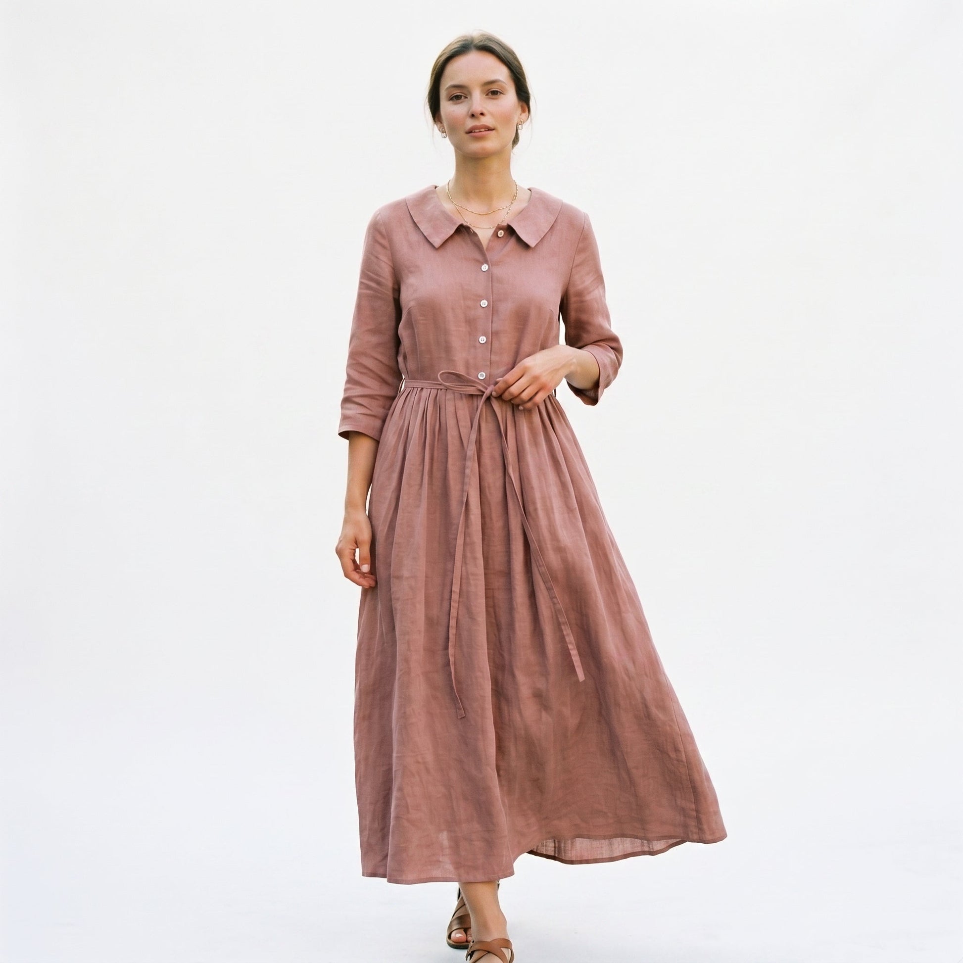 Light Brown - Model wearing a relaxed collared midi shirtdress with a front button placket, three-quarter sleeves, and an adjustable waist tie.
