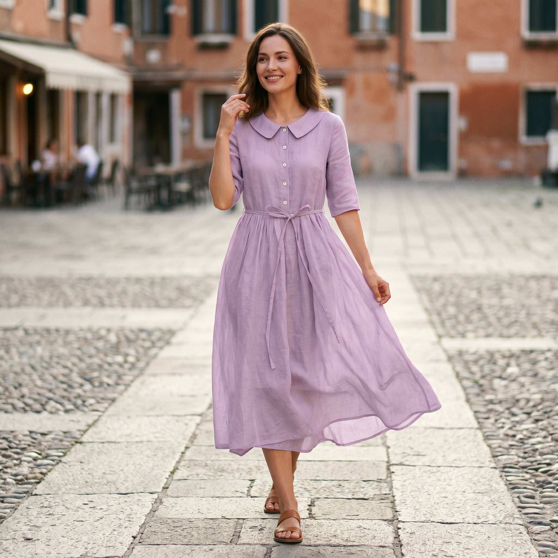 Light Brown - Model wearing a relaxed collared midi shirtdress with a front button placket, three-quarter sleeves, and an adjustable waist tie.