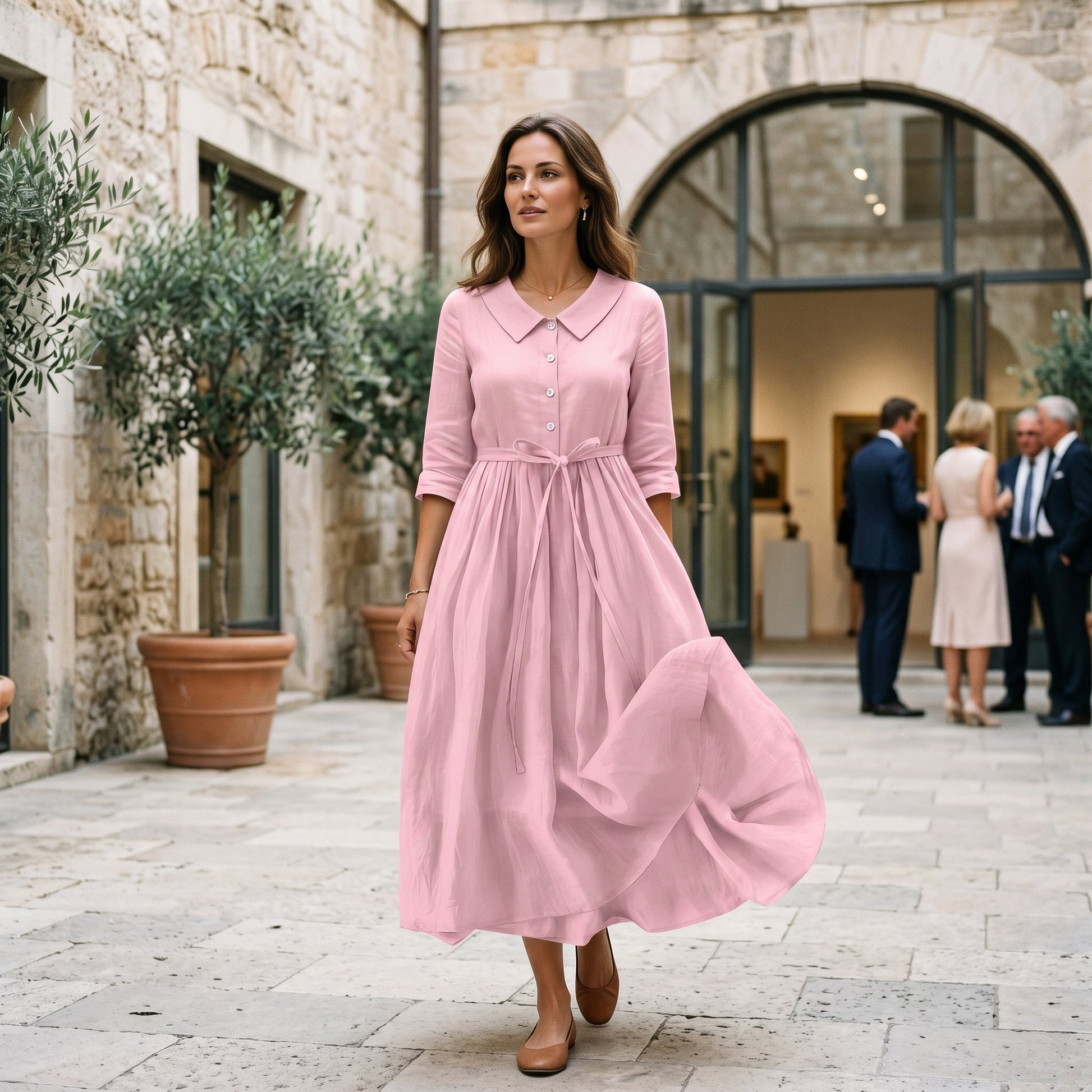 Light Brown - Model wearing a relaxed collared midi shirtdress with a front button placket, three-quarter sleeves, and an adjustable waist tie.