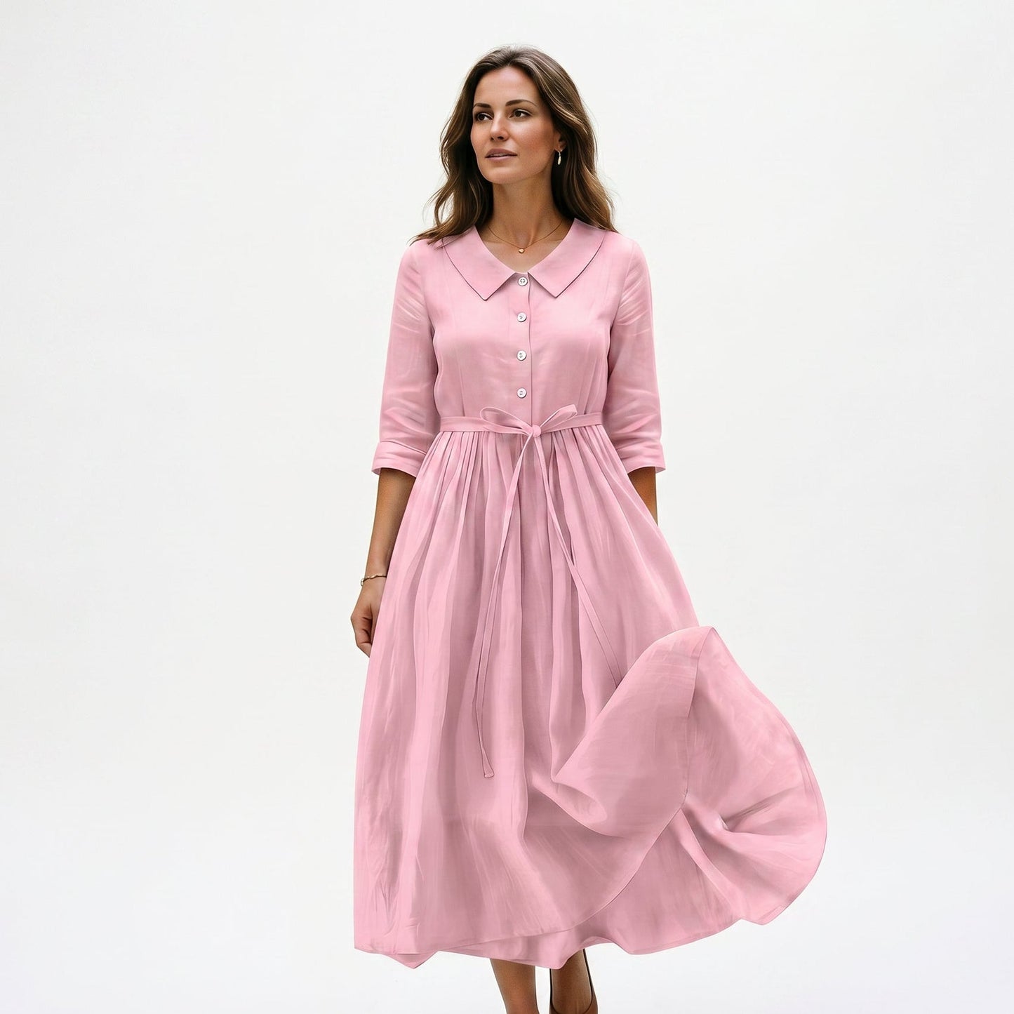 Pink - Model wearing a relaxed collared midi shirtdress with a front button placket, three-quarter sleeves, and an adjustable waist tie.