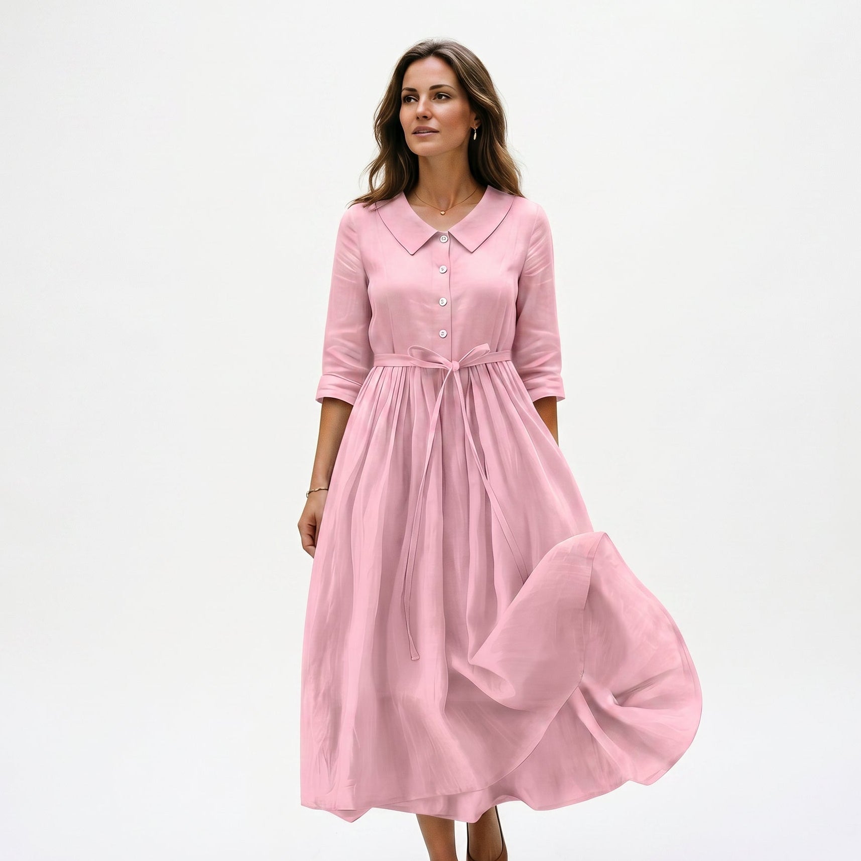 Pink - Model wearing a relaxed collared midi shirtdress with a front button placket, three-quarter sleeves, and an adjustable waist tie.