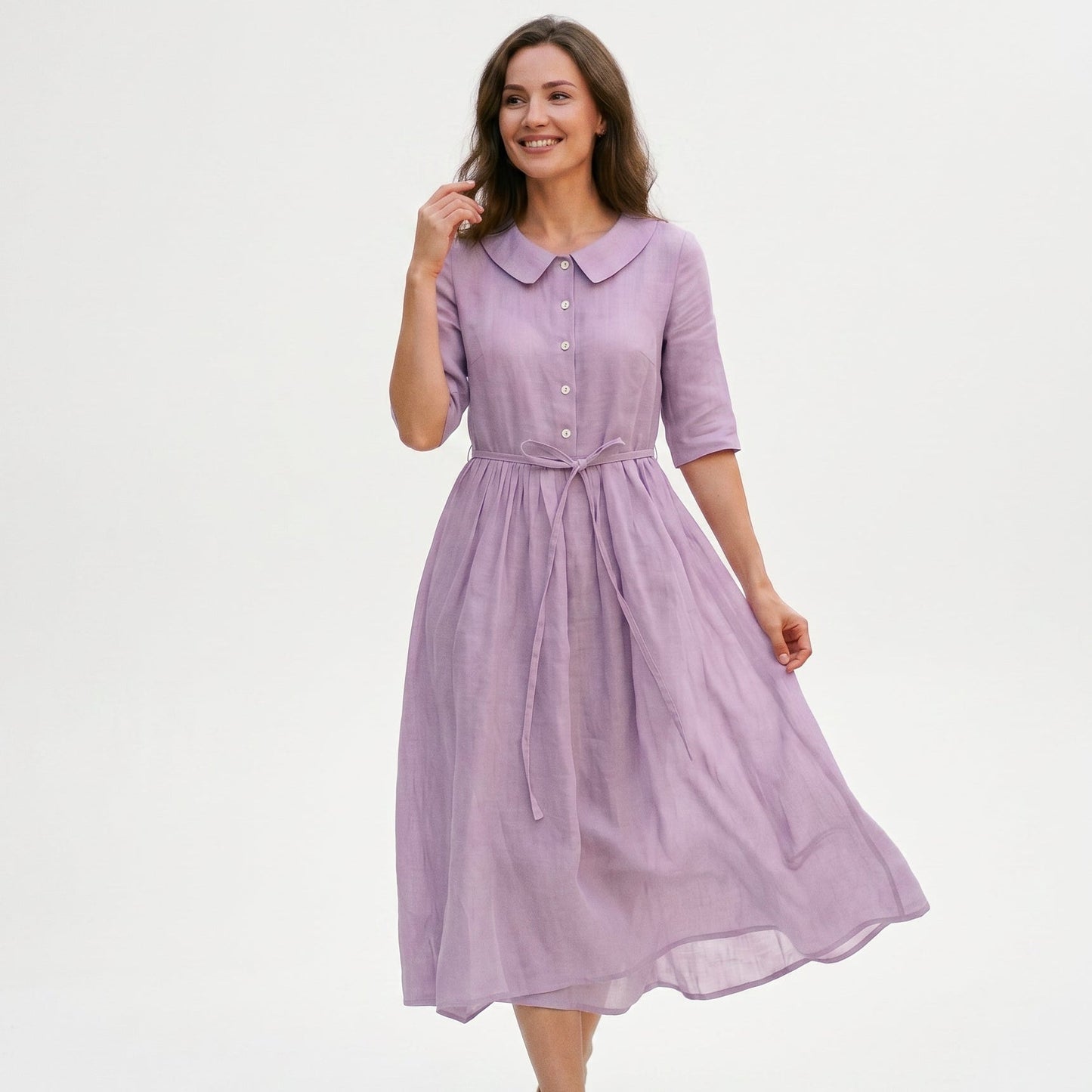 Purple - Model wearing a relaxed collared midi shirtdress with a front button placket, three-quarter sleeves, and an adjustable waist tie.