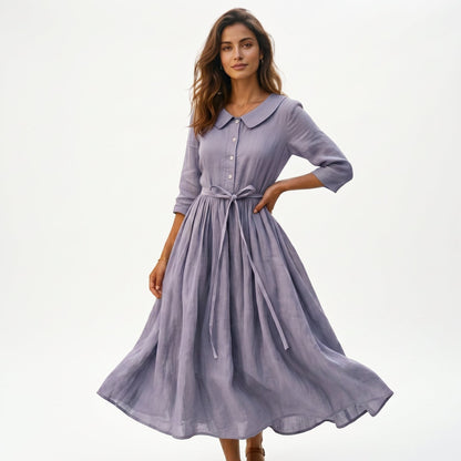 Lavender Gray - Model wearing a relaxed collared midi shirtdress with a front button placket, three-quarter sleeves, and an adjustable waist tie.
