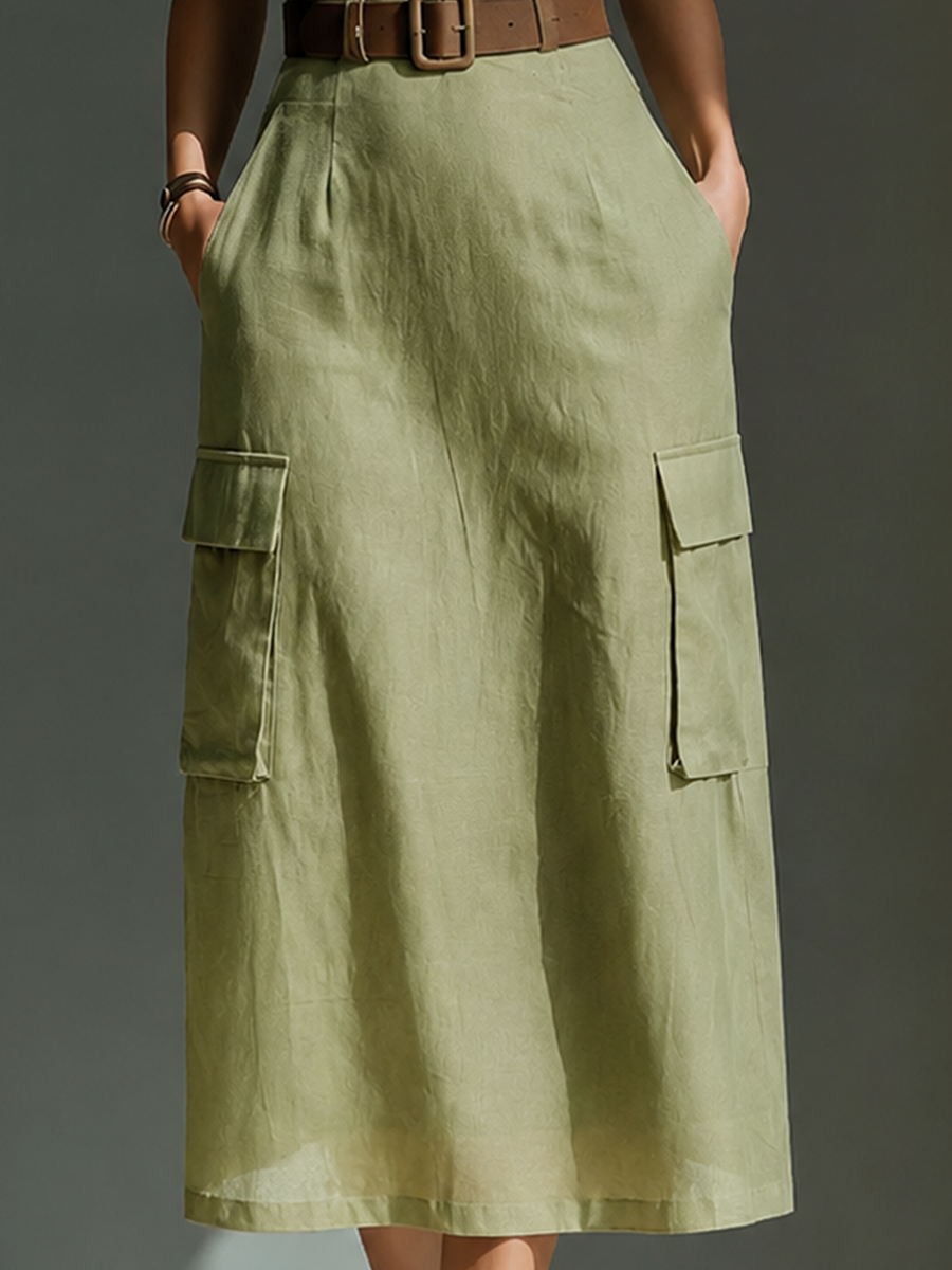 Olive Green - Model wearing a sleeveless square-neck midi dress with a fitted bodice, belted waist, and large cargo pockets on the skirt, styled with strappy heels.