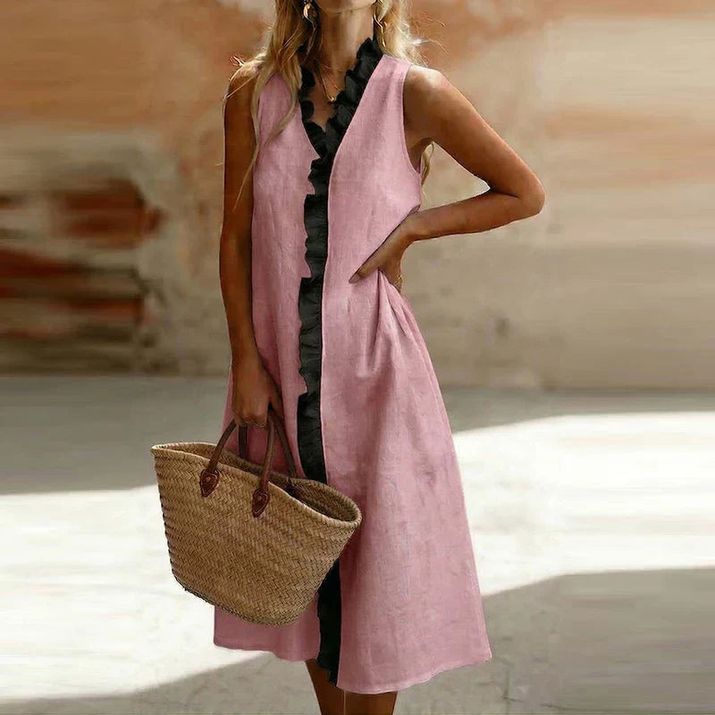 Sky Blue - Sleeveless V-neck midi dress featuring a contrasting ruffle trim down the center front