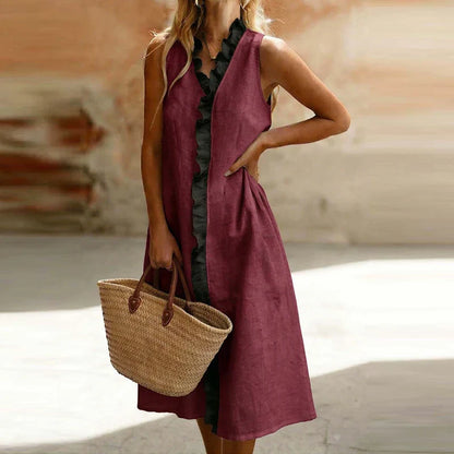 Burgundy - Sleeveless V-neck midi dress featuring a contrasting ruffle trim down the center front