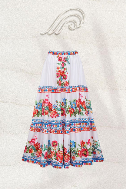 Woman in white floral print swimsuit with ruffled sleeves