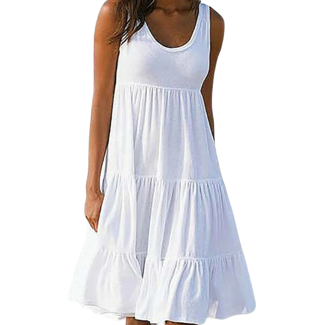 White - A woman wearing a sleeveless white cotton jersey tiered midi sundress with a scoop neckline and relaxed A-line silhouette.