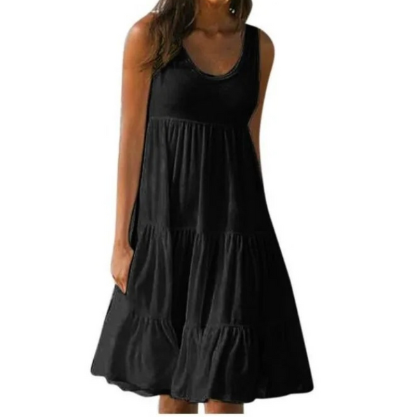 Black - A woman wearing a sleeveless white cotton jersey tiered midi sundress with a scoop neckline and relaxed A-line silhouette.