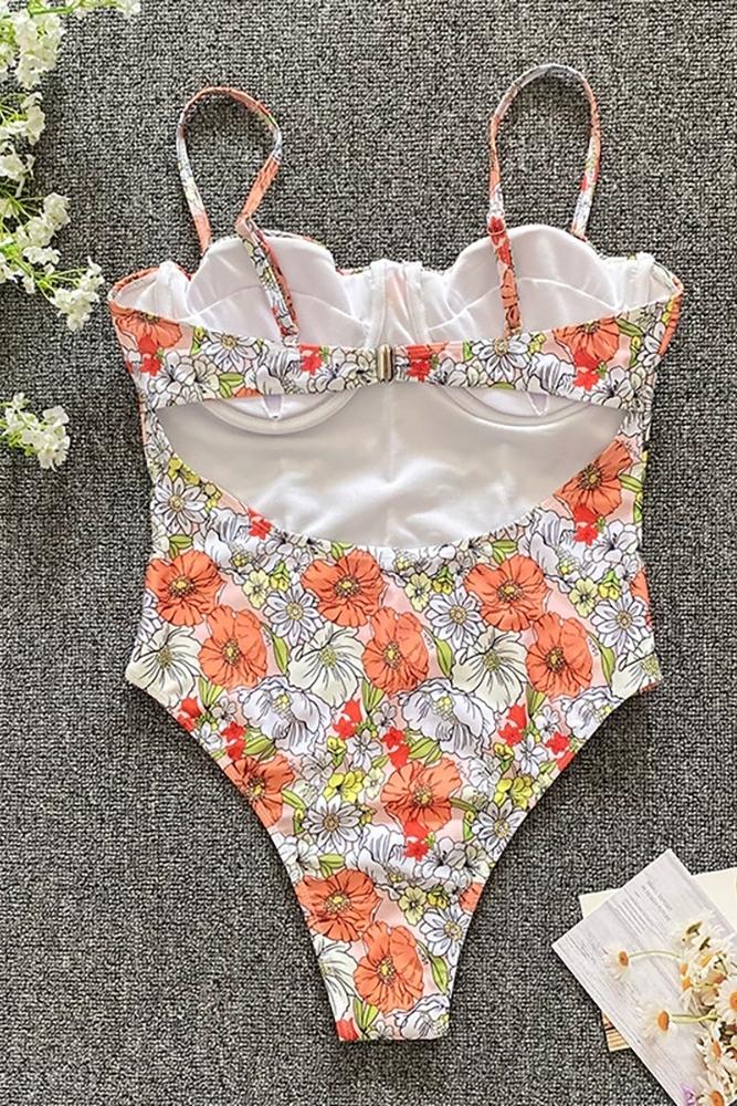 Woman in peach and white plaid one-piece swimsuit