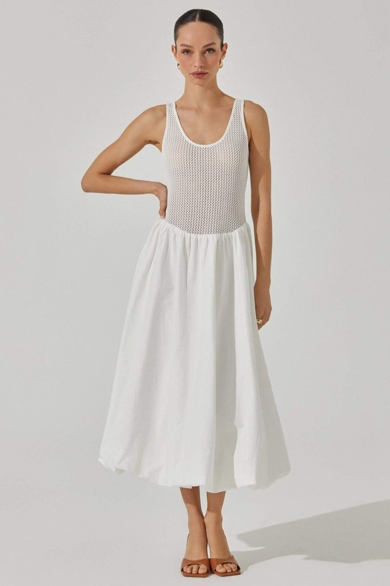 Woman in white crochet knit bodice dress