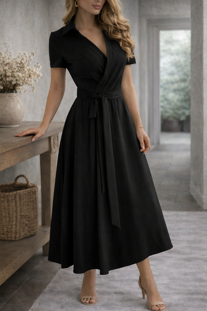 Black V Shaped - A woman wearing an olive green off-the-shoulder midi dress with a matching self-tie belt at the waist, styled with neutral heeled sandals and a black clutch.
