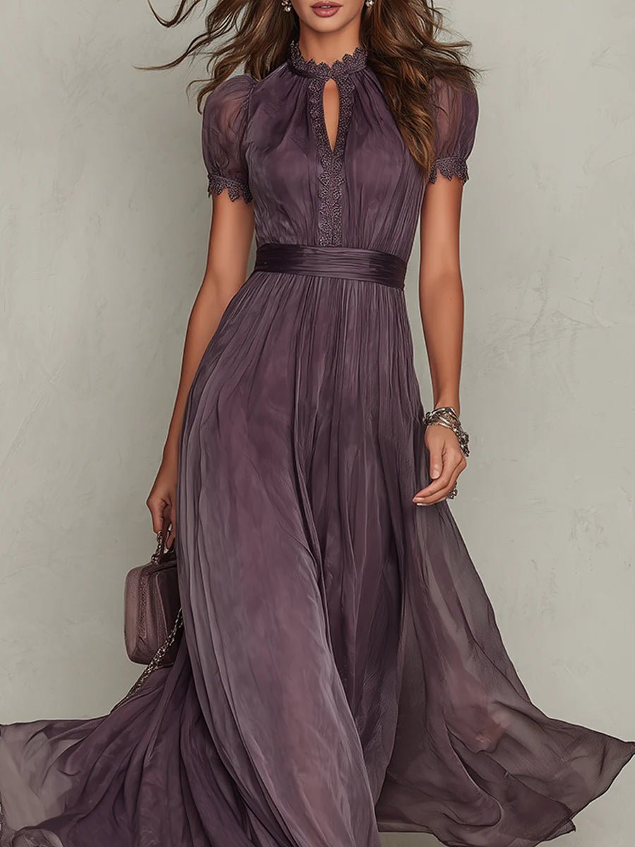 Purple - A woman wearing a flowing, deep mauve pleated chiffon maxi dress with a high keyhole neckline, lace-trimmed puff sleeves, and a banded waist.