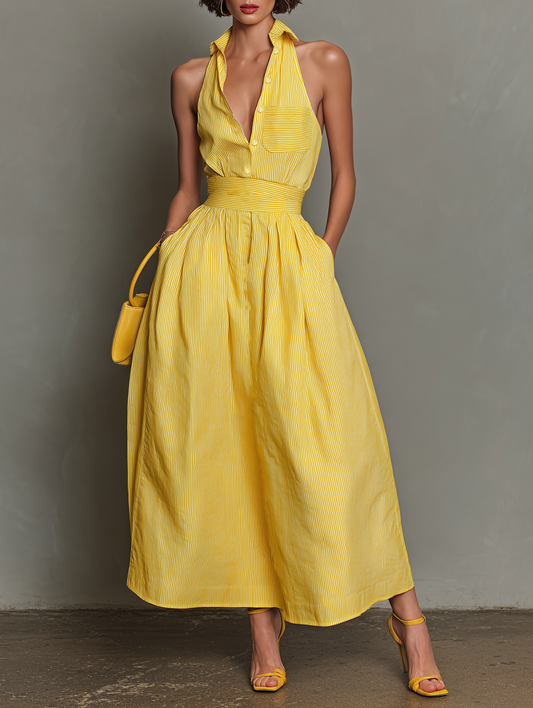 Yellow - Model wearing a striped poplin halter maxi shirtdress with a collared neckline, button front, wide waistband, and full skirt.