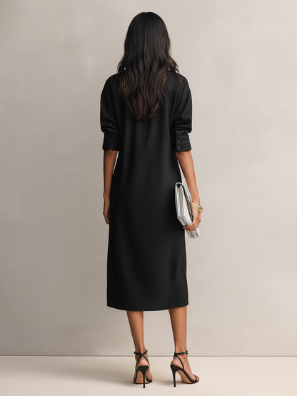 Apricot - Model wearing a relaxed fit collared midi shirtdress with chest pockets and rolled sleeves, styled with gold jewelry and strappy heels